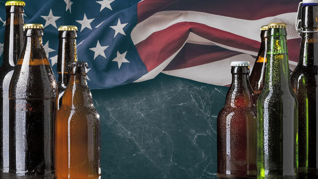 A lineup of classic American beer bottles with condensation, set against a backdrop of the American flag, symbolizing the legacy of U.S. brewing history.