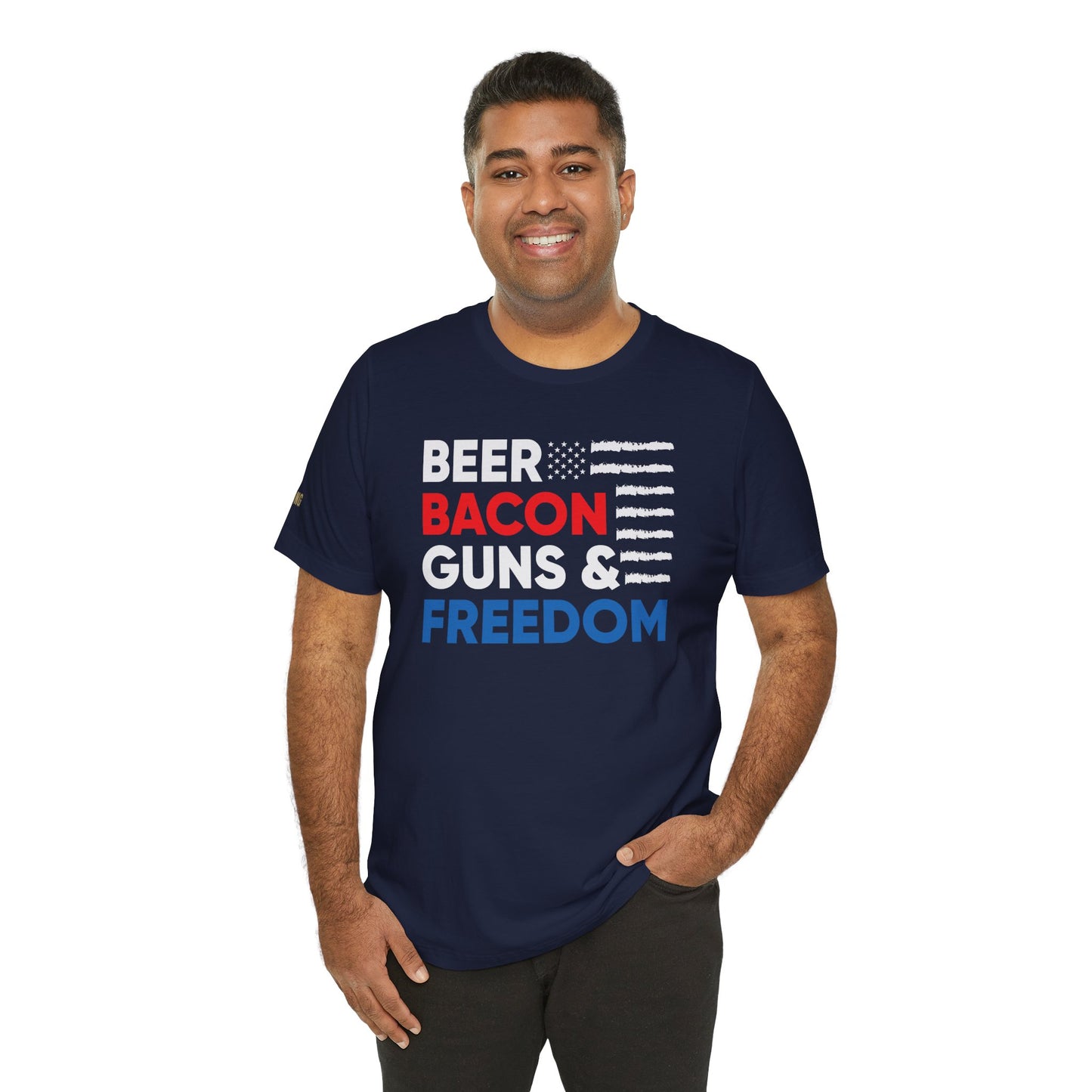 Funny quote Beer Bacon Guns & Freedom T-Shirt with bold red, white & blue American flag design – perfect for patriots and beer lovers. In Navy.