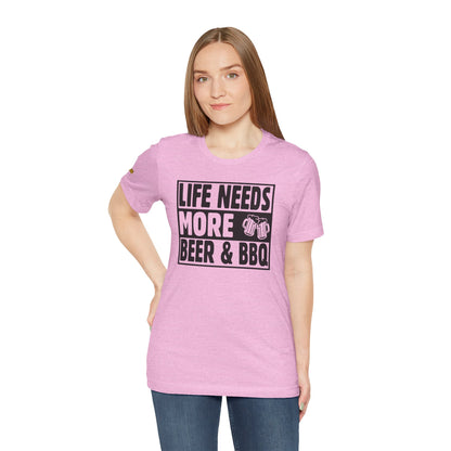 Life Needs More Beer & BBQ t-shirt design featuring bold typography with a playful barbecue and beer theme - in Pink.