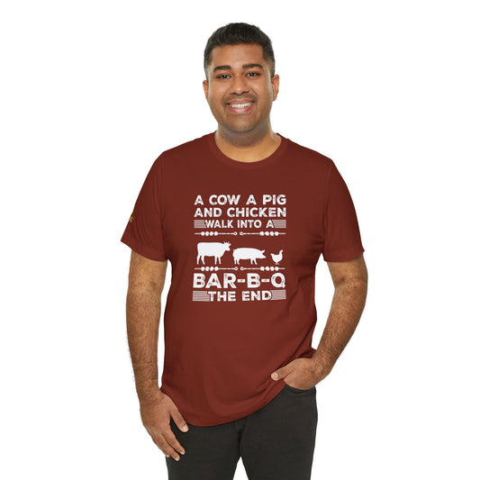 Funny BBQ t-shirt with cow, pig, and chicken design, featuring “A Cow, A Pig, and A Chicken Walk Into a BBQ – The End” text.