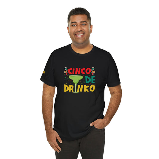A model wearing the Cinco De Drinko t-shirt, available in multiple colors and plus sizes, perfect for Cinco de Mayo celebrations and bar crawls.