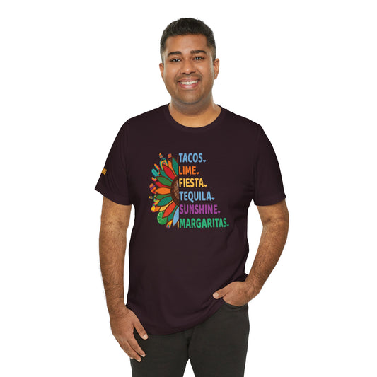 A model wearing the Cinco Bucket List t-shirt, showcasing a colorful sunflower and bold fiesta-themed text.