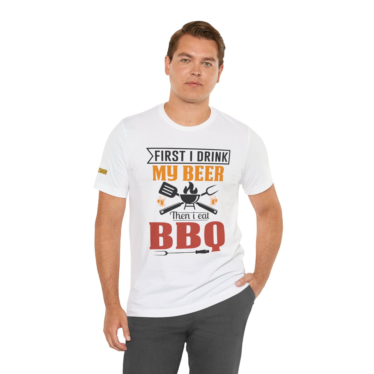 BBQ and beer t-shirt with "First I Drink My Beer, Then I Eat BBQ" text, featuring beer mugs and bold lettering.