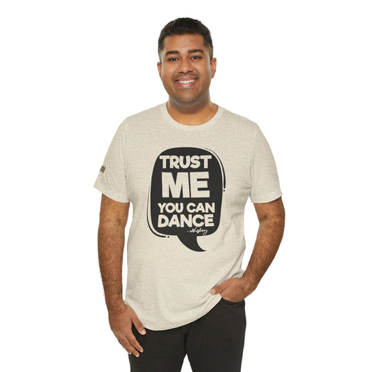 Design featuring the phrase Trust Me, You Can Dance – Whiskey with a playful whiskey glass illustration. Shown in shade of beige; available in many colors and plus sizes.