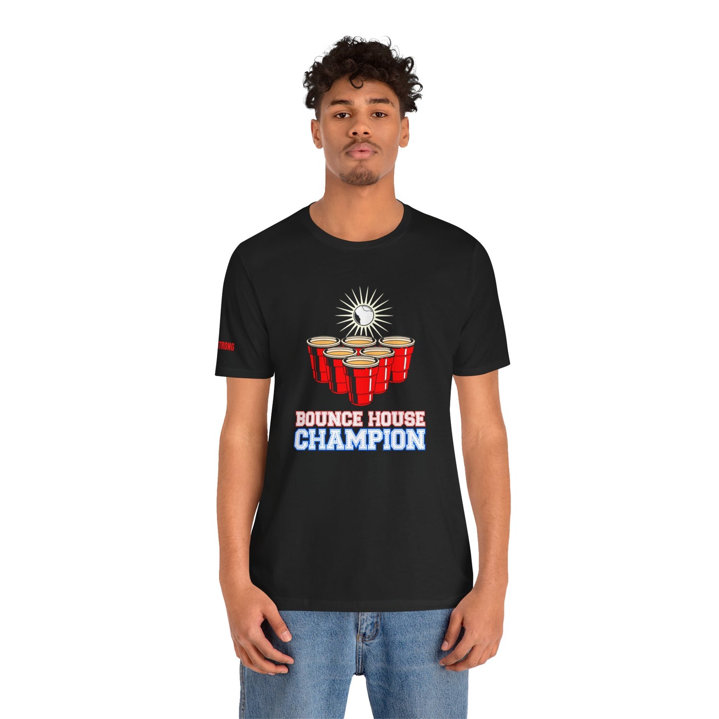 Beer pong-inspired t-shirt with red cups, a glowing ball in mid-bounce, and the bold text “Bounce House Champion.”