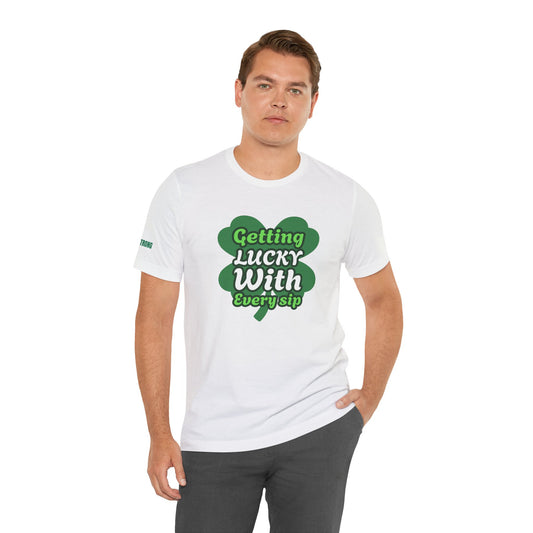 A four-leaf clover with the phrase "Getting Lucky with Every Sip" in bold, playful text—a fun St. Patrick’s Day drinking t-shirt for beer lovers.