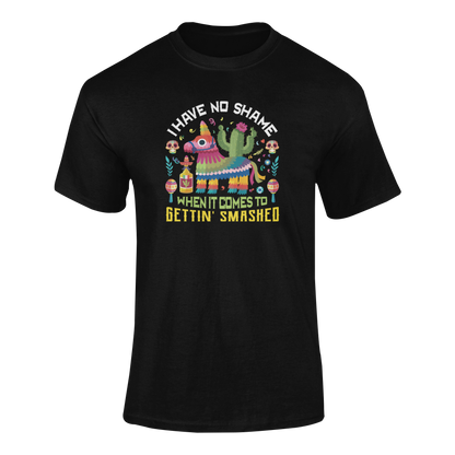 Ghosted mockup of a funny Cinco de Mayo t-shirt featuring a colorful broken piñata spilling candy and maracas.