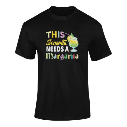 Ghosted mockup of the "This Señorita Needs a Margarita" t-shirt featuring a vibrant margarita glass and colorful typography.