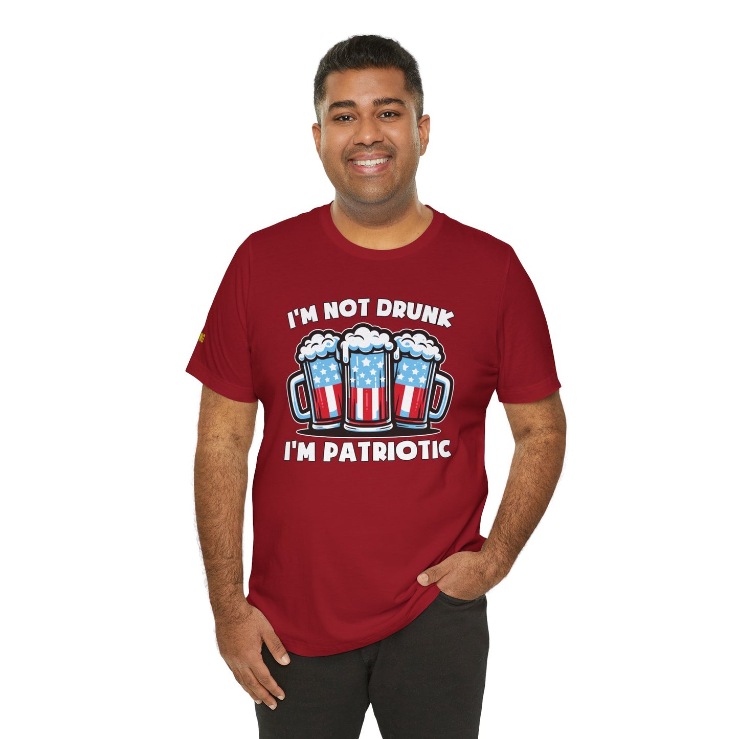Funny ‘I’m Not Drunk, I’m Patriotic’ alcohol quote t-shirt featuring three beer mugs with an American flag design – perfect for beer lovers and 4th of July celebrations. In dark red.