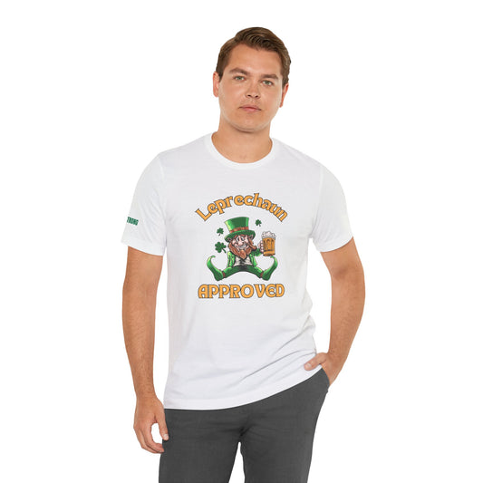 Leprechaun Approved St. Patrick’s Day t-shirt featuring a grinning leprechaun with a beer mug, green outfit, and shamrocks in the background.