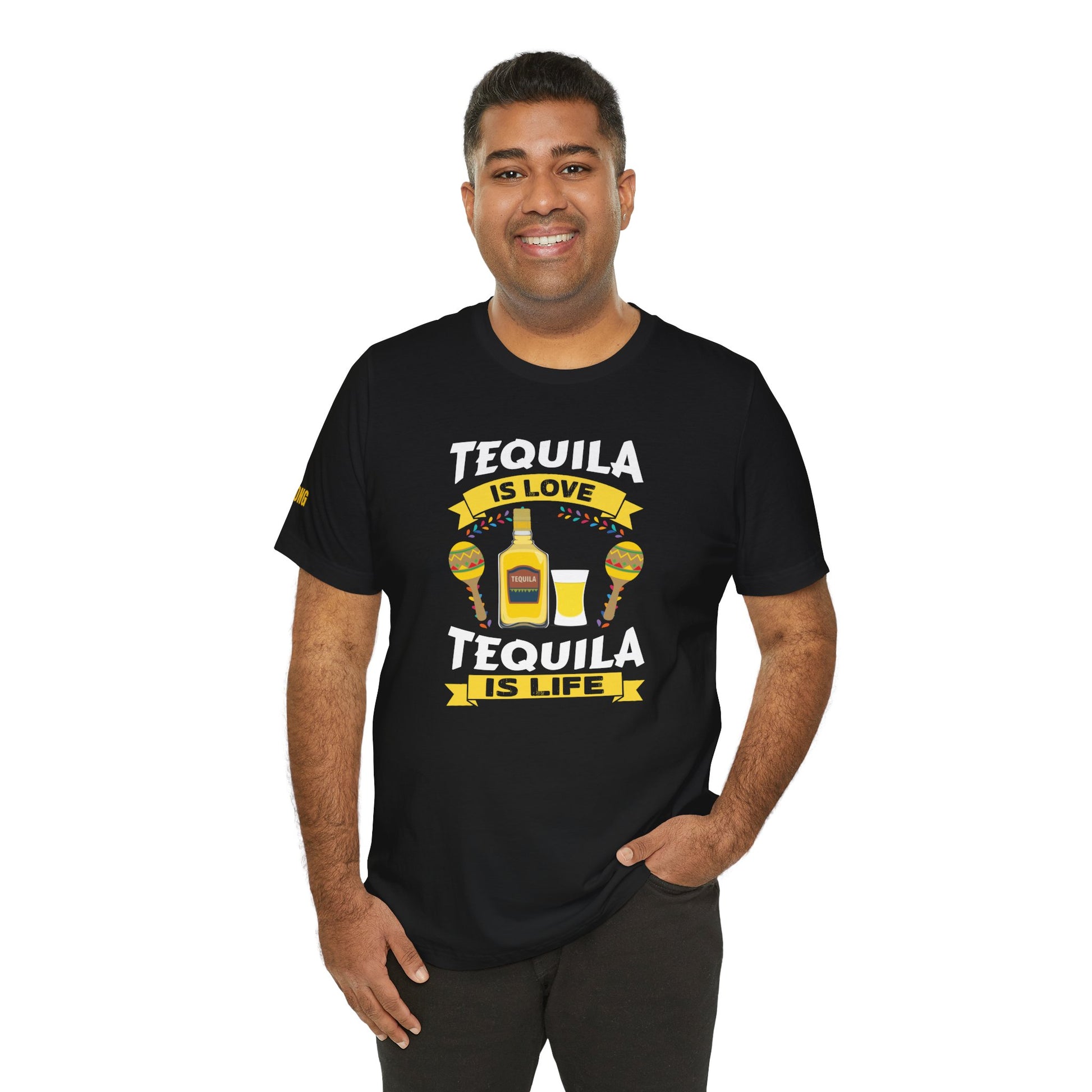Model wearing the "Tequila Is Love, Tequila Is Life" t-shirt, available in multiple colors and plus sizes, ideal for tequila lovers and partygoers.