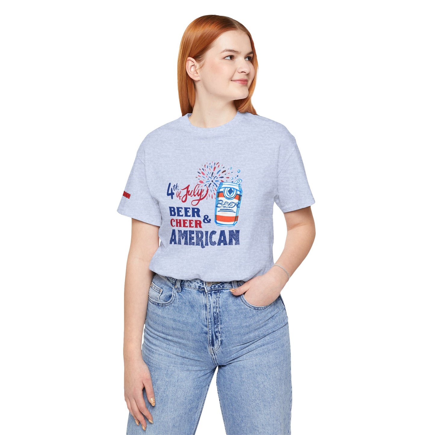 Funny 4th of July beer t-shirt featuring a red, white, and blue exploding beer can, fireworks, and bold patriotic text saying "Beer & Cheer American." Perfect for Independence Day, beer lovers, and patriotic celebrations. in Heather Soft Blue.
