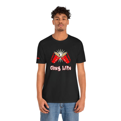 Funny beer pong t-shirt featuring two red party cups clinking with a beer pong ball in the center. The text reads “Chug Life” in a bold, graffiti-style font.