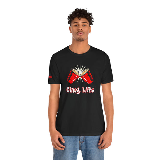 Funny beer pong t-shirt featuring two red party cups clinking with a beer pong ball in the center. The text reads “Chug Life” in a bold, graffiti-style font.