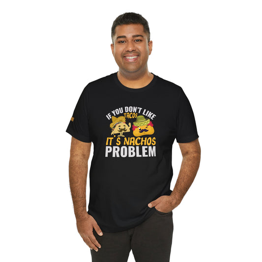 Model wearing a funny Cinco de Mayo t-shirt featuring a taco and nacho-themed pun, available in multiple colors and plus sizes.