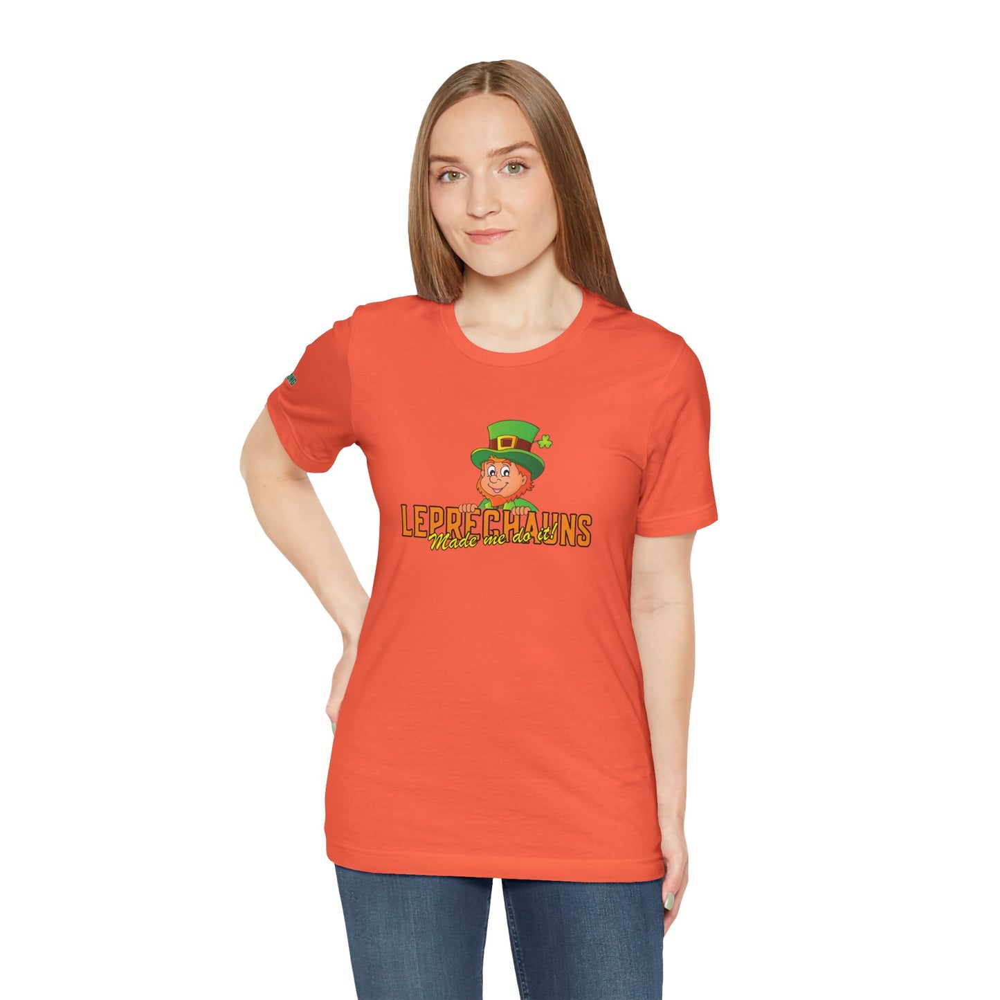 Illustrated cheerful leprechaun in a green hat leaning over text that reads "Leprechauns Made Me Do It." A funny St. Patrick’s Day drinking t-shirt for partygoers and beer lovers.