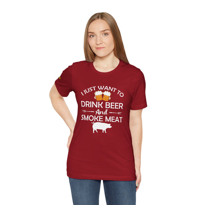 Beer and BBQ-themed t-shirt featuring "Drink Beer & Smoke Meat" with a smoker and grilling elements.