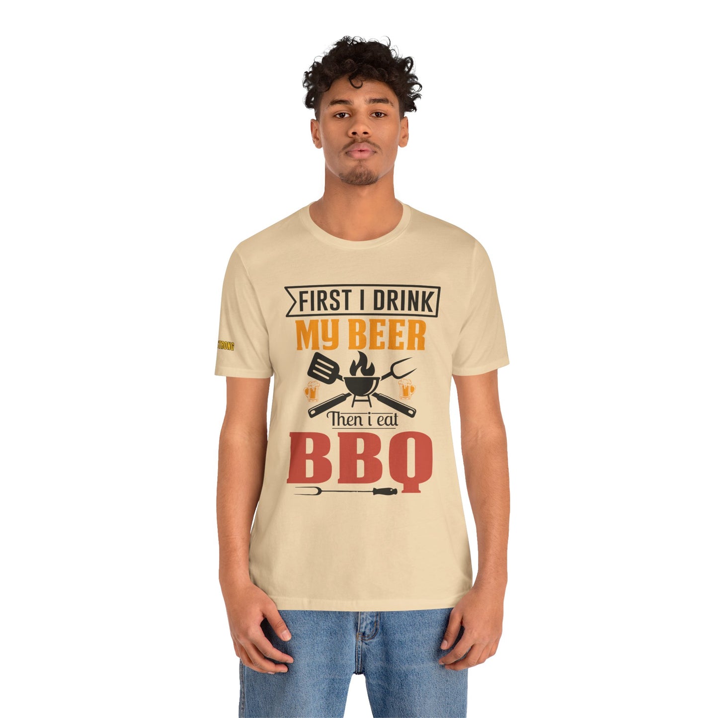 BBQ and beer t-shirt with "First I Drink My Beer, Then I Eat BBQ" text, featuring beer mugs and bold lettering.