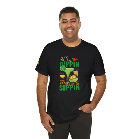 Model wearing a vibrant Cinco de Mayo t-shirt featuring a margarita and chip-themed design, available in multiple colors and plus sizes.