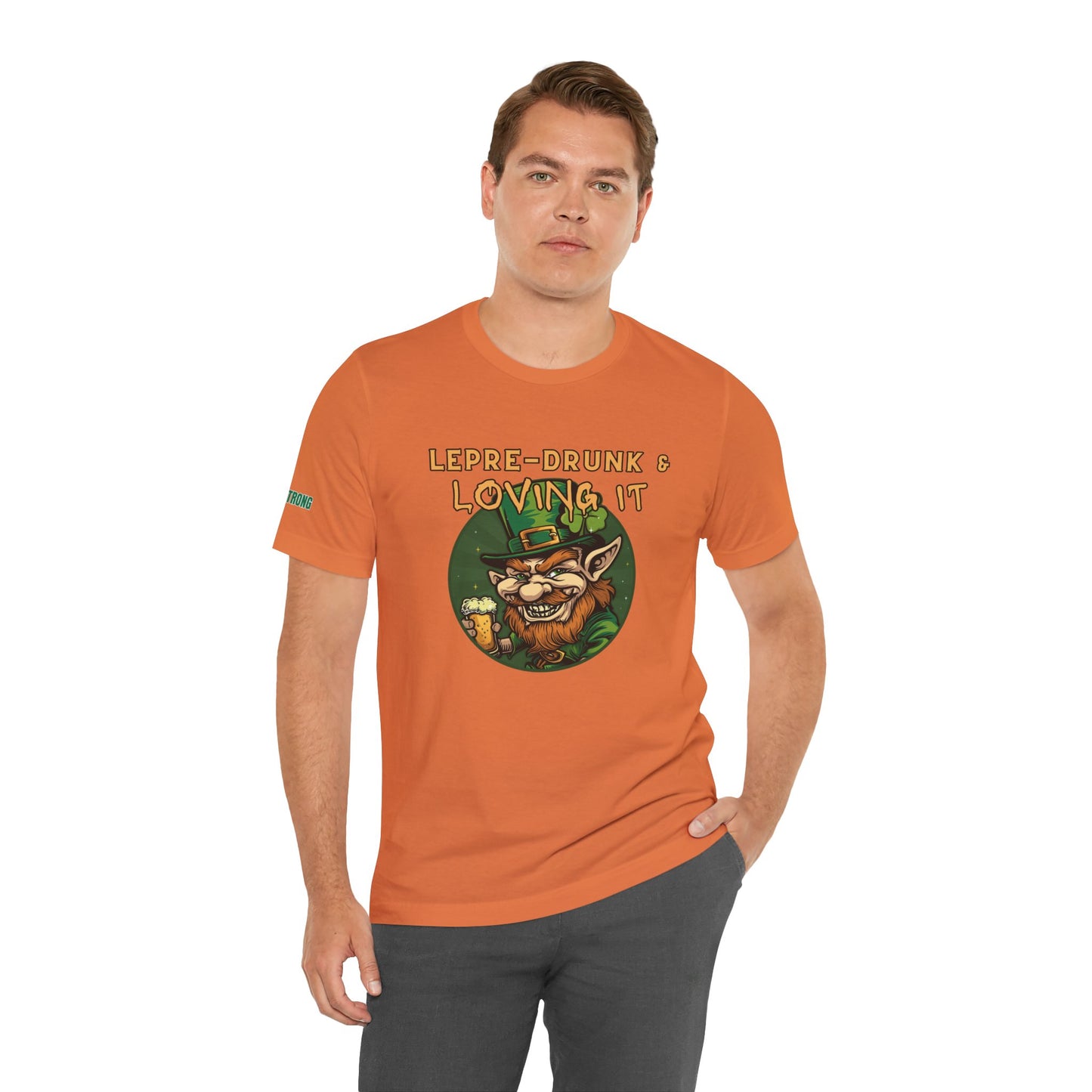 Illustrated grinning leprechaun holding a beer, wearing a green hat with a shamrock, with the text "Lepre-Drunk & Loving It." A funny St. Patrick’s Day drinking t-shirt perfect for beer lovers and partygoers.