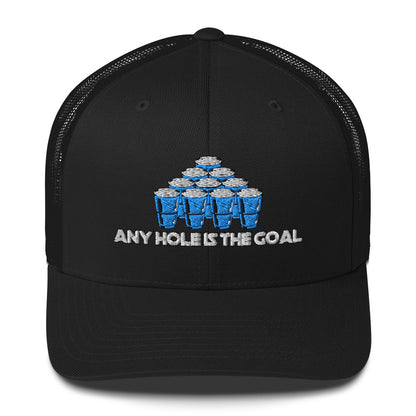 Ghosted mockup of the Any Hole Is the Goal beer pong hat sitting flat, featuring a stack of blue solo cups. Available in multiple colors.